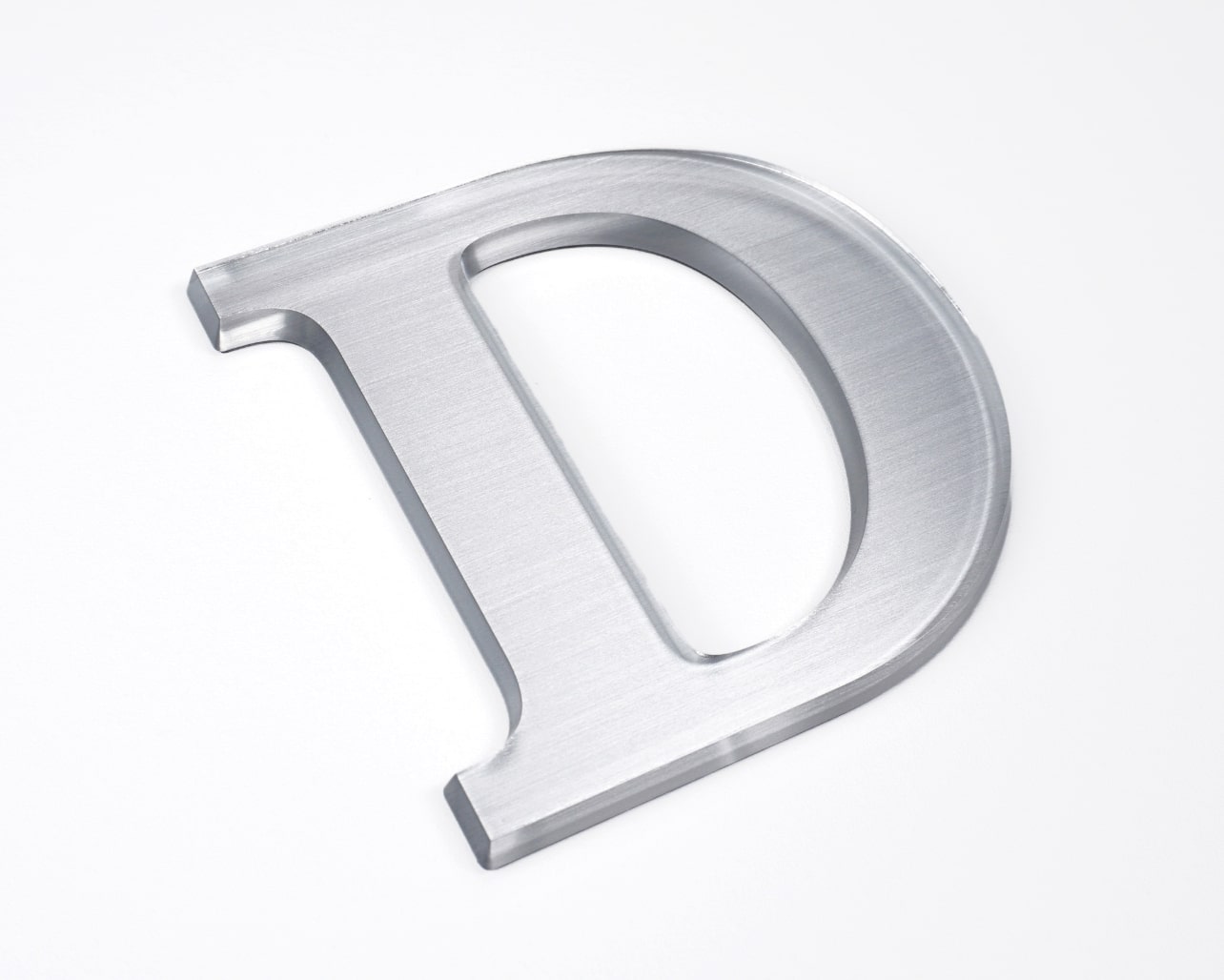 Type: Crystal Letter 5mm Thick / 15°Bevel Cut Finish: Brushed Aluminum Silver on Rear Side